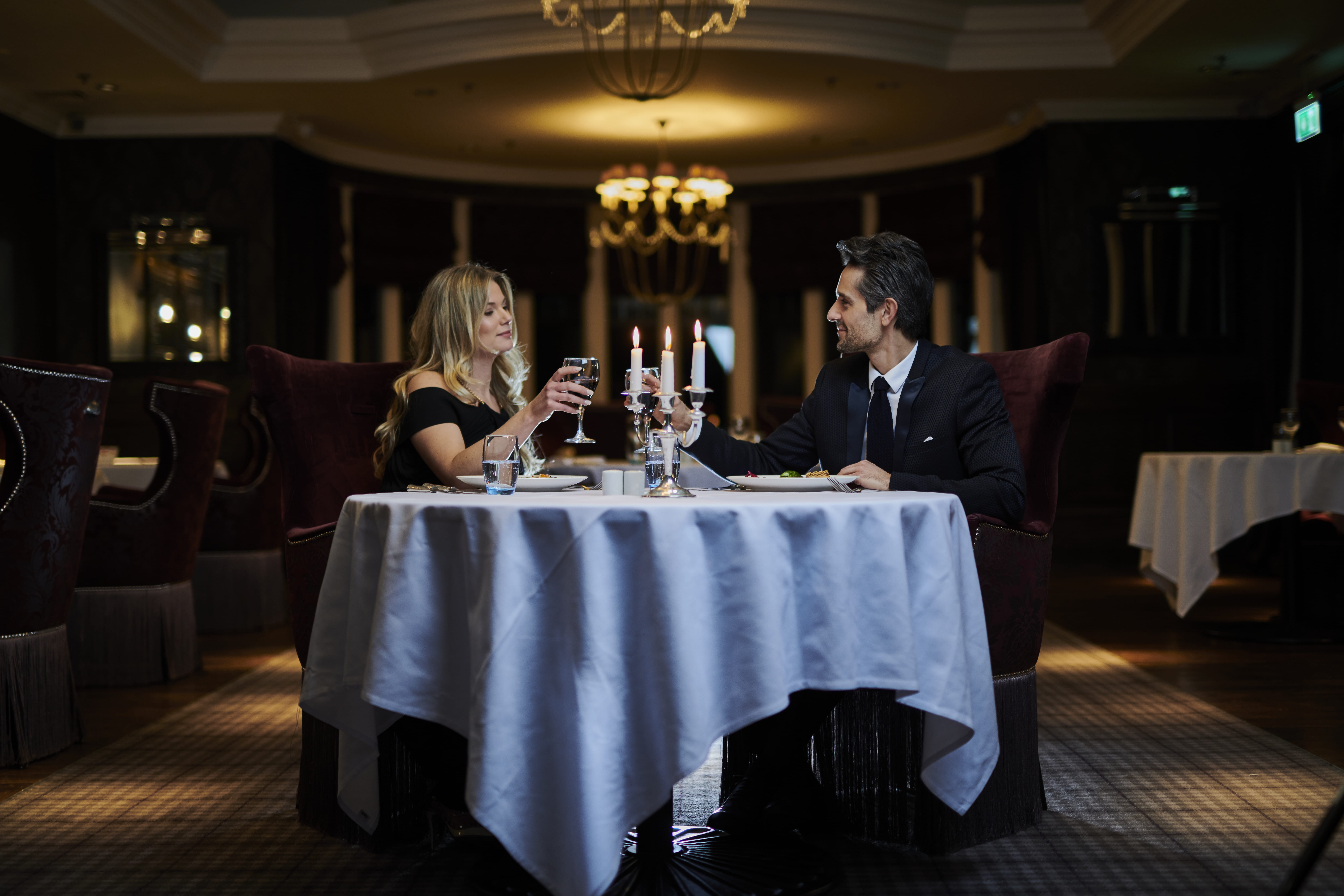 Portraiture photo of a couple at a restaurant - Hospitality Photographic